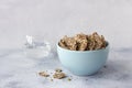 Healthy multigrain gluten-free crackers, ketogenic, from chia seeds, flax, sesame and ground pumpkin seeds in ceramic bowl Royalty Free Stock Photo