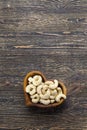 cashew nuts in a heart-shaped plate Royalty Free Stock Photo