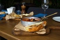 Delicious hearty lunch at a fish restaurant. Tuscan tomato soup with seafood Cacciucca.