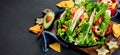 Hispanic mexican food, meat tacos with shrimps on dark background Royalty Free Stock Photo