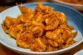 A delicious home-cooked dish, fried shrimp with salted egg yolk Royalty Free Stock Photo