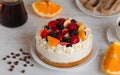 Delicious home made cake with fruits and cream. Royalty Free Stock Photo