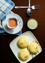 Rava idli with chutney and Tea on the table