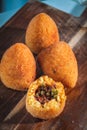 Delicious home made rice balls  from Sicily, called Arancine Royalty Free Stock Photo