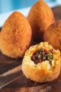 Delicious home made rice balls  from Sicily, called Arancine Royalty Free Stock Photo