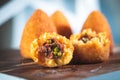 Delicious home made rice balls  from Sicily, called Arancine Royalty Free Stock Photo