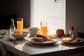 A delicious home-style breakfast with crispy bacon, eggs, pancakes, toast, coffee, and orange juice AI generated Royalty Free Stock Photo