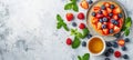 Delicious homemade american pancakes with fresh berries and honey on white background