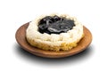 Delicious Homemade Blueberry Cheese Pie in wooden plate on white background Royalty Free Stock Photo