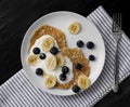 Delicious homemade breakfast with pancakes at black stone background Royalty Free Stock Photo