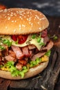 delicious homemade burgers of beef, cheese and vegetables on a wooden board, Hamburger. Fast food concept Royalty Free Stock Photo