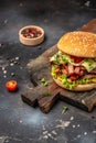 delicious homemade burgers of beef, cheese and vegetables on a wooden board, Hamburger. Fast food concept Royalty Free Stock Photo