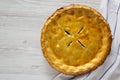 Delicious homemade Canadian Tourtiere Meat Pie on a white wooden table, top view. Flat lay, overhead, from above. Copy space Royalty Free Stock Photo