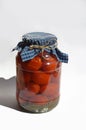 homemade canned blanks. pickled tomatoes, appetizer, canned vegetables. background for the design.