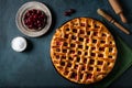 Delicious Homemade Cherry Pie with a Flaky Crust on dark background. Top view. American pie. Cherry dessert. Flatlay