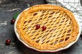 Delicious Homemade Cherry Pie, Flaky Crust, piece on a plate and the whole homemade cherry pie, Long banner format. top view Royalty Free Stock Photo