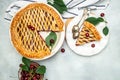 Delicious Homemade Cherry Pie, Flaky Crust, piece on a plate and the whole homemade cherry pie. top view Royalty Free Stock Photo