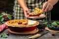 Delicious Homemade Cherry Pie, Flaky Crust, piece on a plate and the whole homemade cherry pie, place for text, top view Royalty Free Stock Photo