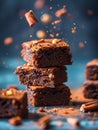 Delicious Homemade Chocolate Brownies with Nuts and Falling Cocoa Powder on a Blue Background Royalty Free Stock Photo