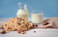 Delicious homemade chocolate chip cookies, paired with fresh milk in a glass and pitcher, placed on a white wooden floor and a Royalty Free Stock Photo