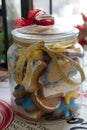 Delicious homemade colourful christmas cookies in a handmade decorated jar Royalty Free Stock Photo