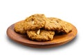 Delicious homemade crispy coconut cookies in wooden plate