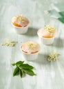 Delicious homemade cupcakes with elderberry flowers.