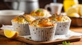 Delicious homemade lemon poppy seed muffins with blurred kitchen background and copy space Royalty Free Stock Photo