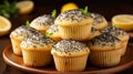 Delicious homemade lemon poppy seed muffins on blurred kitchen background with copy space Royalty Free Stock Photo