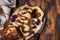 Delicious homemade marble pound cake on wooden background