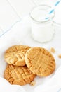 Delicious homemade peanut butter cookies with mug of milk. White Royalty Free Stock Photo