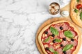 Delicious homemade pita pizza and cold drink on white marble table, flat lay. Space for text Royalty Free Stock Photo