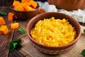 Delicious homemade pumpkin porridge on wooden background. Healthy vegan food Royalty Free Stock Photo