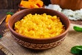 Delicious homemade pumpkin porridge on wooden background. Healthy vegan food Royalty Free Stock Photo