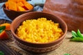 Delicious homemade pumpkin porridge on wooden background. Healthy vegan food Royalty Free Stock Photo