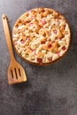 Delicious homemade rhubarb pie with almonds close-up in a dish. vertical top view Royalty Free Stock Photo