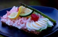 A delicious homemade spicy shrimp sandwich with eggs, citrea, tomatoes, asparagus and sallad Royalty Free Stock Photo