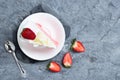 Delicious homemade strawberry cake and fresh milk cream in white dish on gray stone table rustic style. Top view with copy space Royalty Free Stock Photo