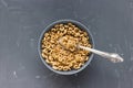 Delicious honey cheerios cereal in bowl with milk and spoon, copy space Royalty Free Stock Photo