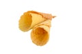 Delicious honeyed waffles, twisted into cones without stuffing isolated on white background