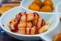 A delicious Hong Kong-style tea restaurant dish, mixed sauce rice rolls