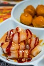 A delicious Hong Kong-style tea restaurant dish, mixed sauce rice rolls