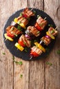 Delicious hot grill shish kebab from pork with vegetables, serve