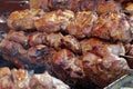 Delicious hot kebabs. Shish kebabs broils in barbecue Royalty Free Stock Photo