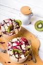 Delicious ice cream in a cup with tasty fruits Royalty Free Stock Photo
