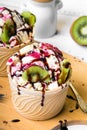 Delicious ice cream in a cup with tasty fruits Royalty Free Stock Photo