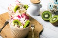 Delicious ice cream in a cup with tasty fruits Royalty Free Stock Photo