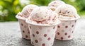 delicious ice cream scoops in polka dot cups Royalty Free Stock Photo