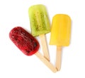 Delicious ice pops on white background, top view. Fruit popsicle Royalty Free Stock Photo