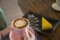 Delicious iced mocha and cheesecake on top of wooden table stock photo